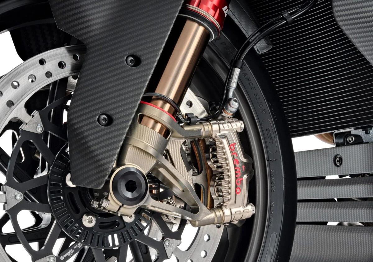 Le bas d'une fourche, un étrier de frein Brembo GP4-MS, des pièces en carbone