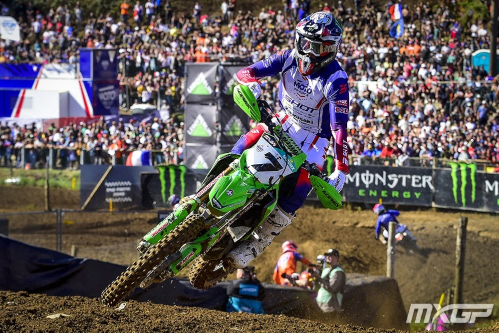 Romain Febvre on his green Kawasaki, number 7, wearing his French national team jersey in front of his home crowd