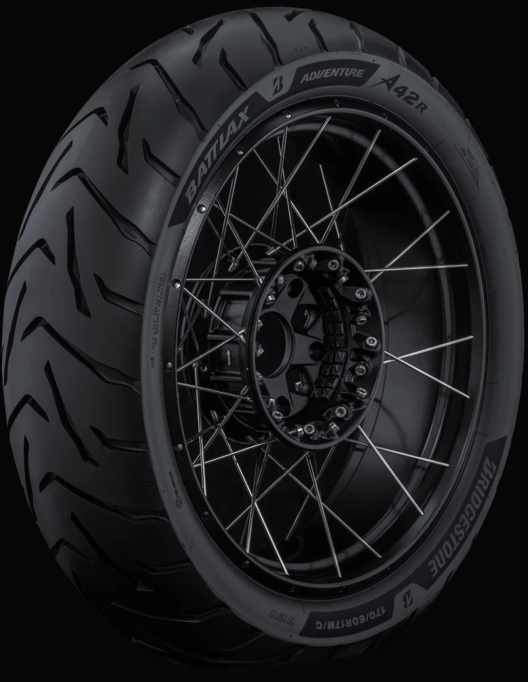 Rear tire of the Bridgestone BATTLAX ADVENTURE A42 on a black background