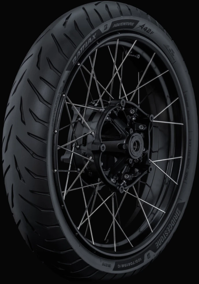 Front tire of the Bridgestone BATTLAX ADVENTURE A42 on a black background